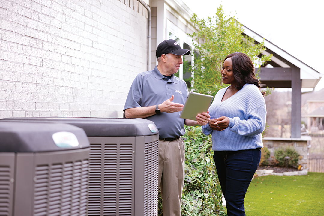 11_Outside_AC2_Tablet_Tech_HO_025_cmyk Installing a high-efficiency air conditioning system