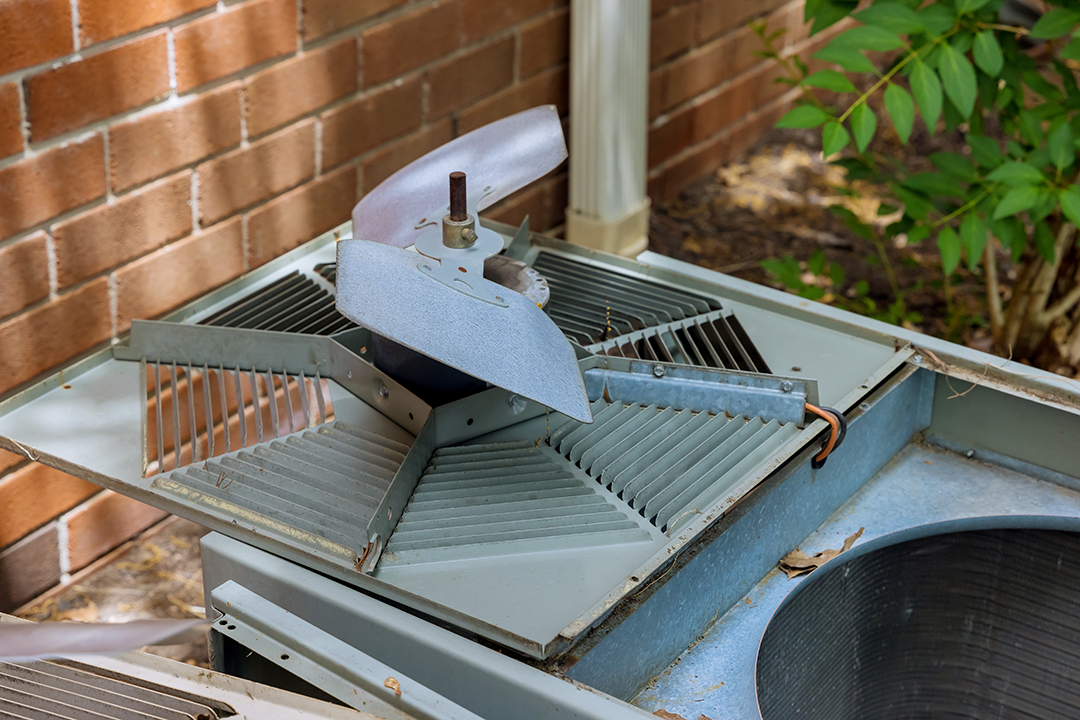 clogged-air-conditioner-condenser-cooling-fins