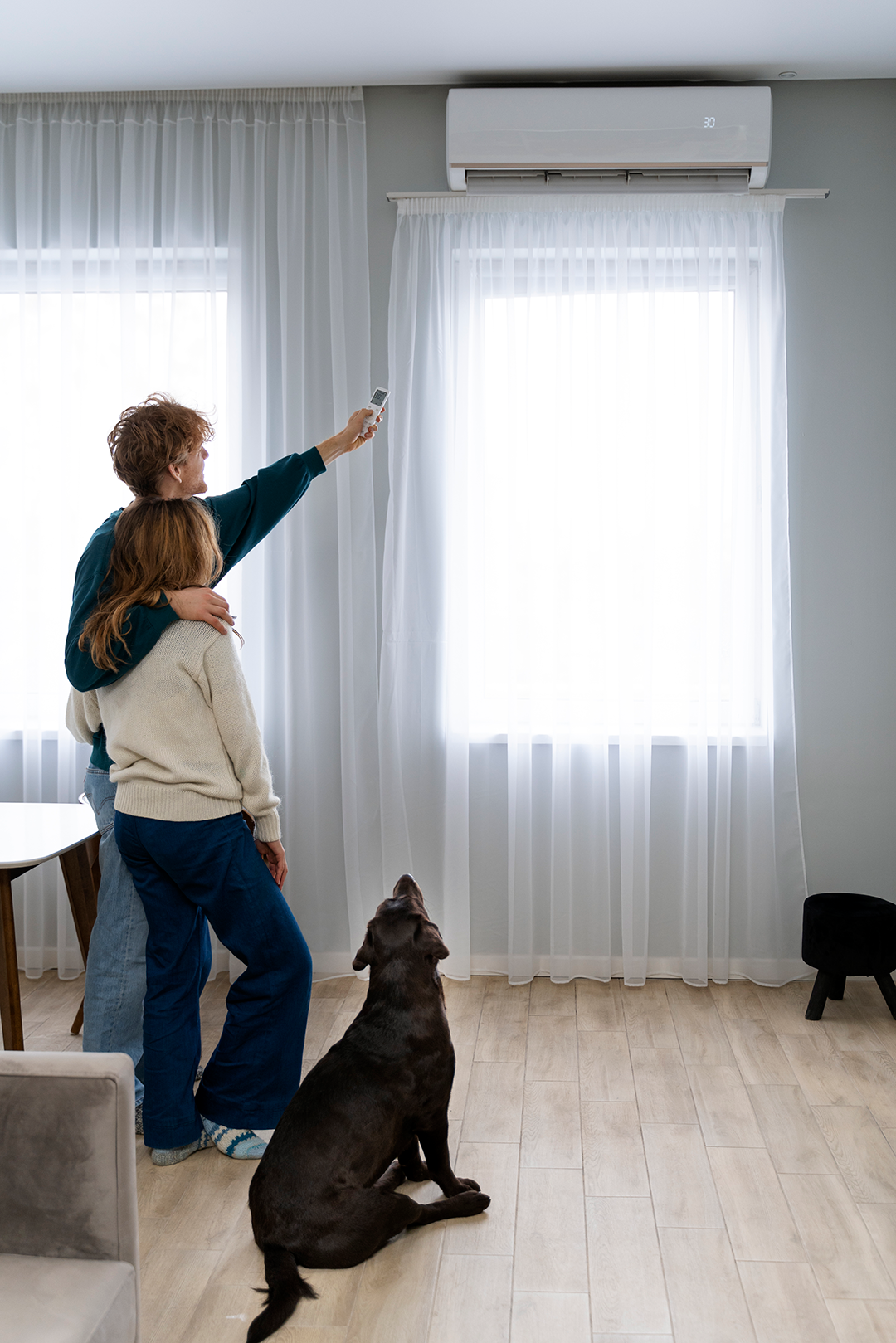 full-shot-couple-dog-home