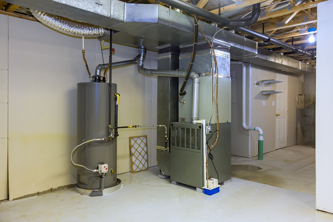 gas-furnace-in-basement-of-home Gas heating system in basement