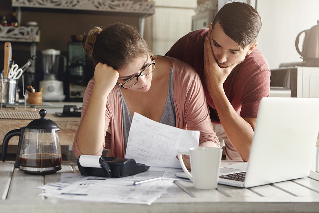 young-stressed-caucasian-couple-facing-financials-troubles